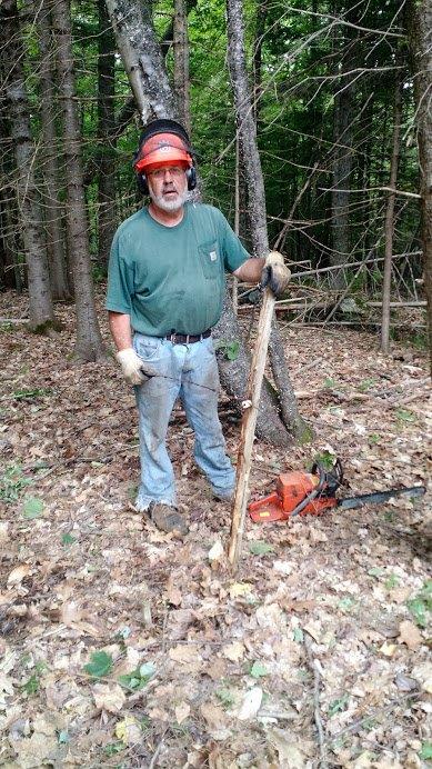 Russell Black working on his Maine Tree Farm