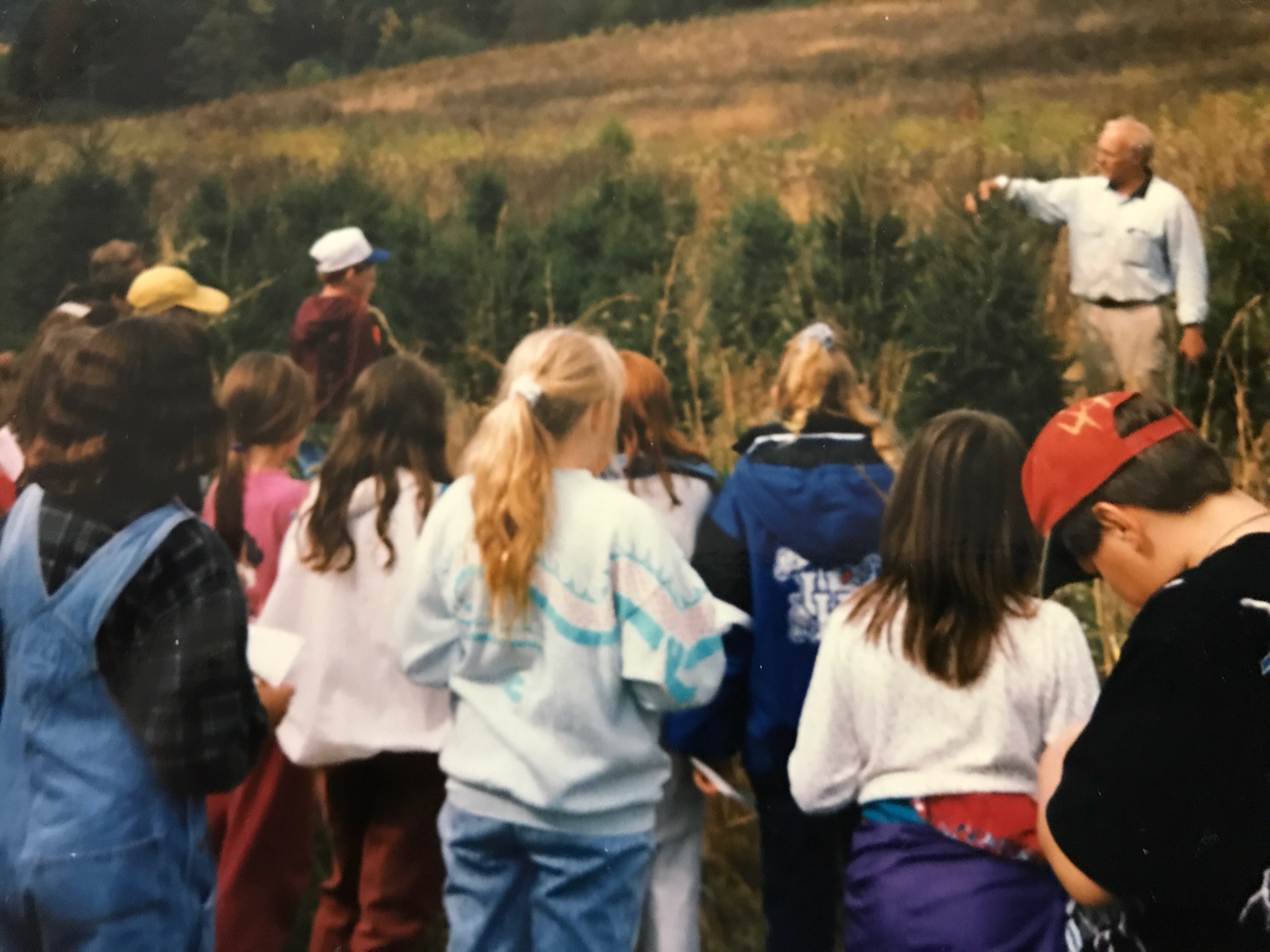 Dr. Loyd with students on his land